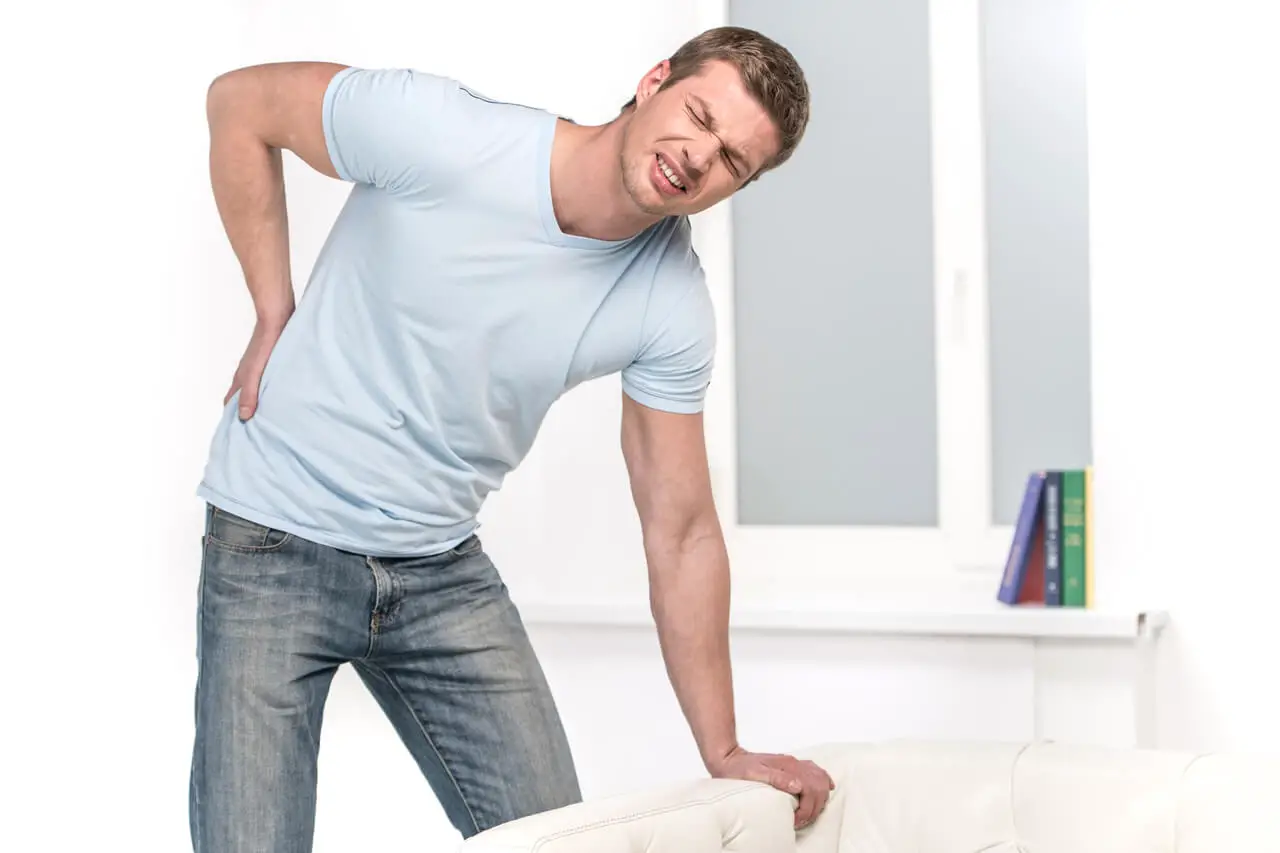 4 Causes Of Lower Back Pain When Standing (And How To ...