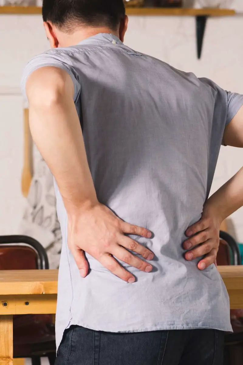 Can back pain be a symptom of prostate cancer?