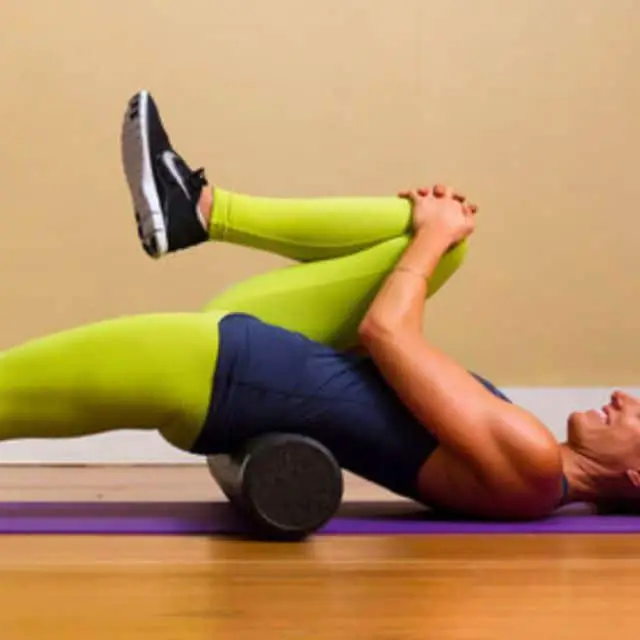Lower Back Rolls With Knee Pull
